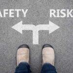 Arrows facing opposite directions with the words Safety and Risk