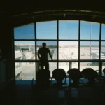 Man at airport traveling while on testosterone replacement therapy.