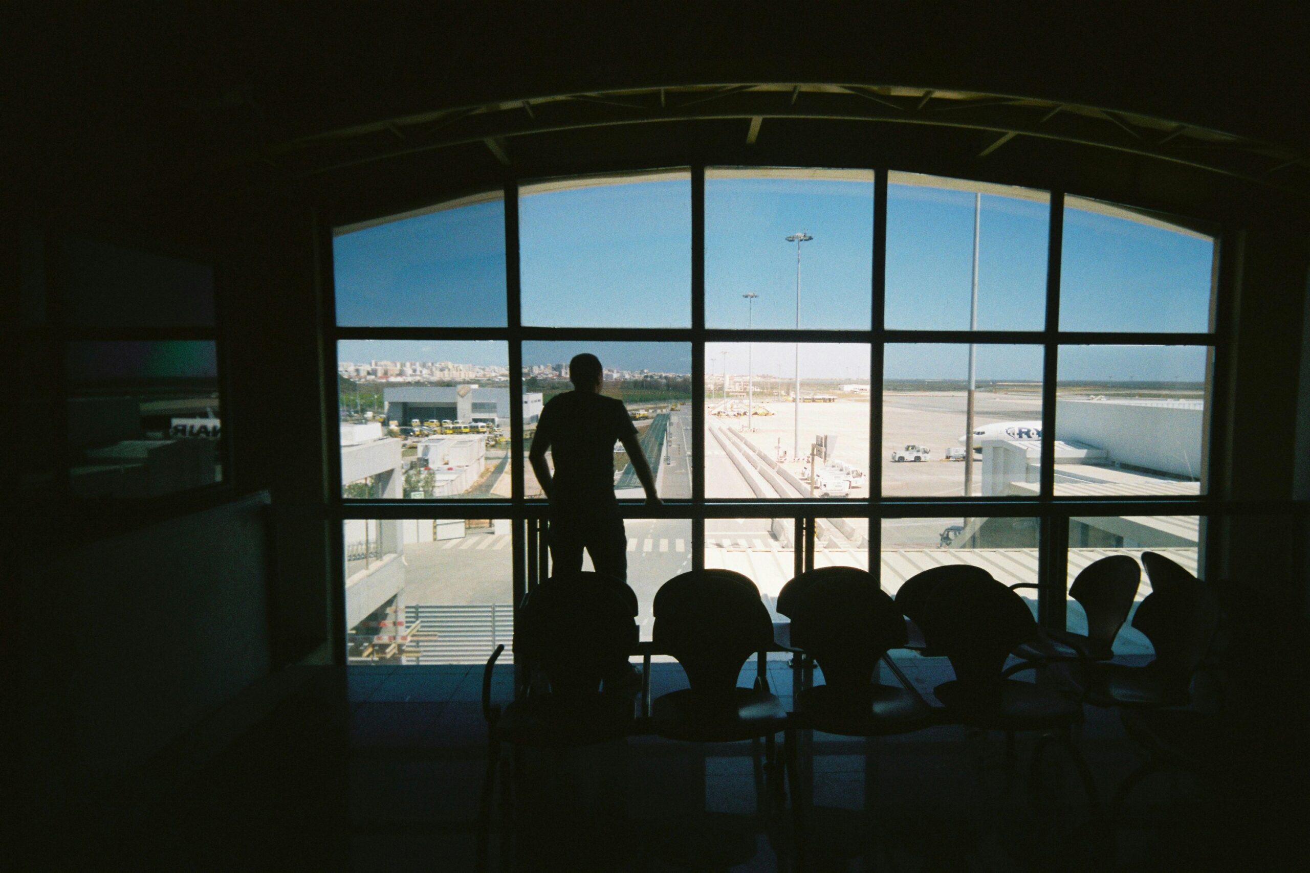 Man at airport traveling while on testosterone replacement therapy.